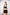 woman wearing black CAN. Syndicate Contour Sculpt Crop top and Can. Syndicate Contour Sculpt Bike Shorts with 'CAN' logos on them. 